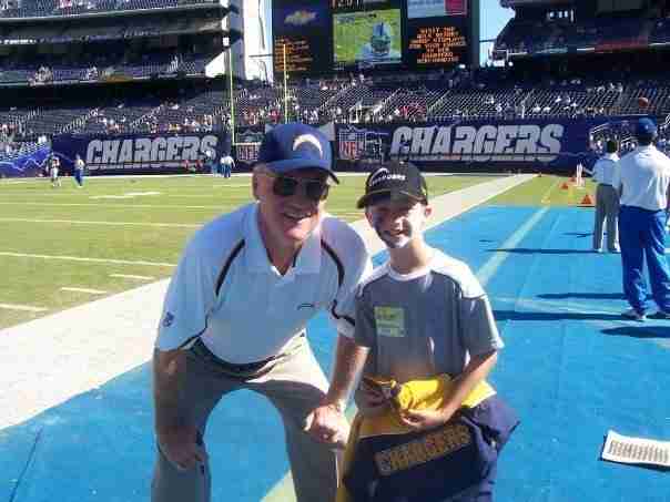 Marty Schottenheimer Poses With A Young Fan As Chargers Head Coach