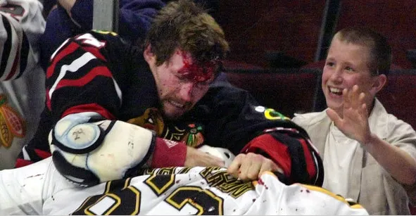 NHL Enforcers - Bob Probert Administers A Beating As A Young Fan Cheers Him On